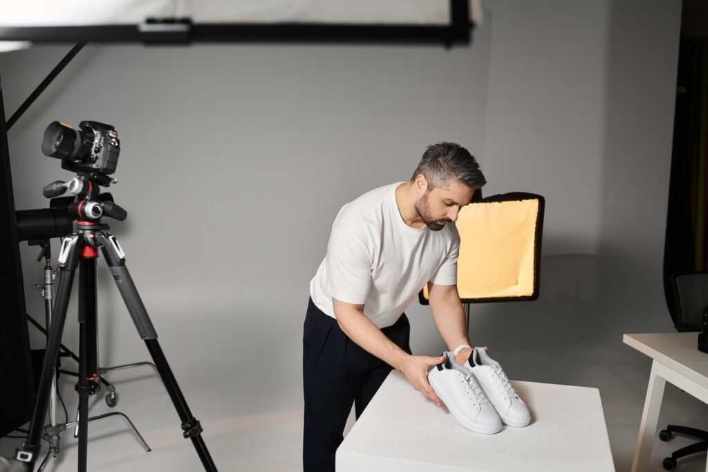 a man putting on a pair of shoes