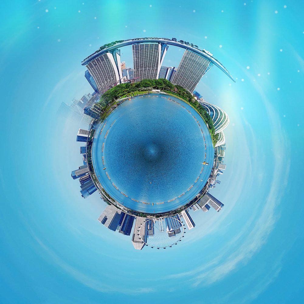 a planet with a city and water